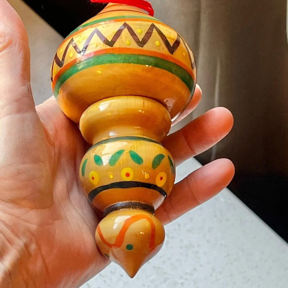 Handcrafted Wooden Hanging Ornament With Vibrant Tribal Patterns